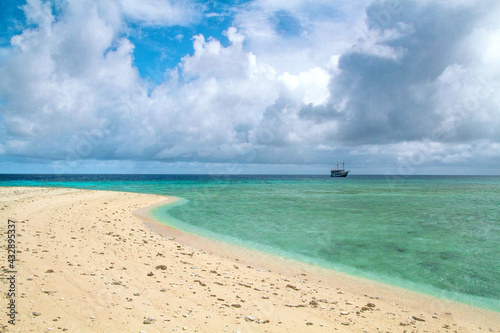 Advertising, Travel, Vacation and Holiday Concept - Beautiful view pristine beach in a small remote island