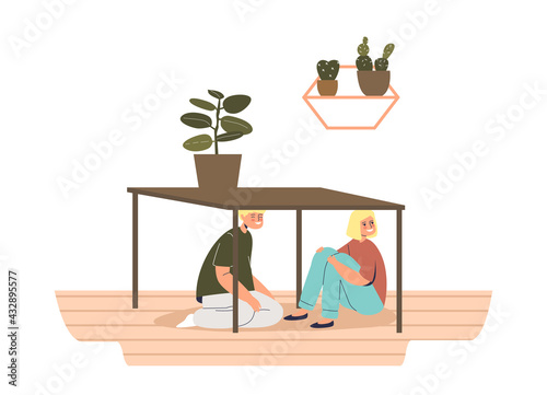 Little kids hiding under table playing in hide and seek game at home. Indoor funny leisure activity