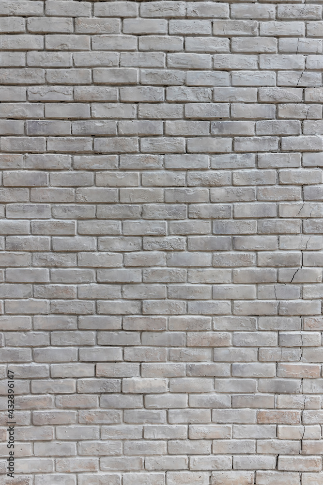 Obraz premium White brick wall background in rural room. Abstract weathered texture stained old stucco light gray. White grunge brick wall background. Misty brick wall for background or texture.