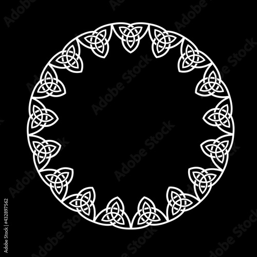 round openwork frame of celtic intertwined patterns