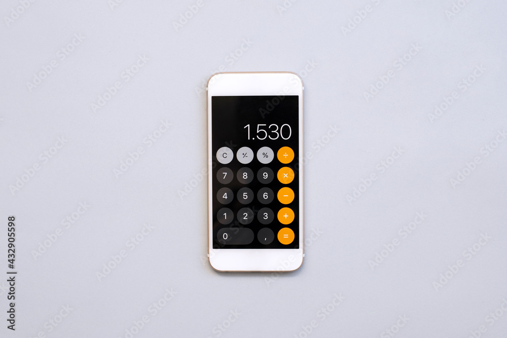 smart phone with calculator on gray background	 - obrazy, fototapety, plakaty 