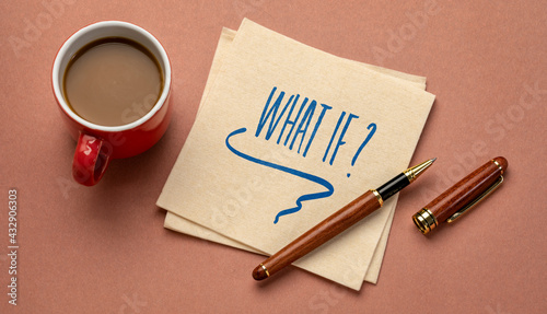 Photography What if question - handwriting on napkin with a cup of coffee, doubt, speculatio