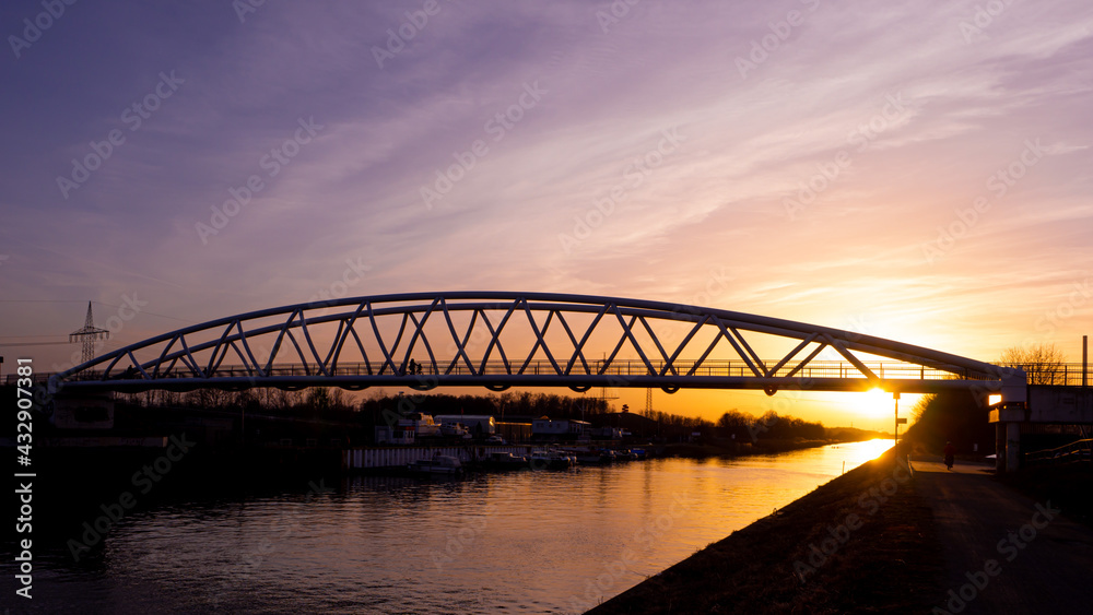 Bridge over the Datteln Hamm Kanal river in Hamm Westfalen Ruhrgebiet at sunset