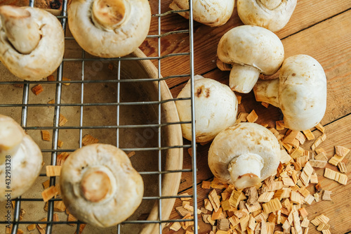 Large mushrooms. Mushrooms on a wooden background, cooking fresh mushrooms.