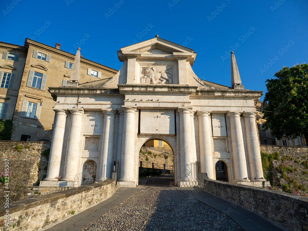 Obraz premium Bergamo, Italy. The old town. Amazing view at the ancient gate Porta San Giacomo. Bergamo one of the most beautiful cities in Italy. Tourists destination