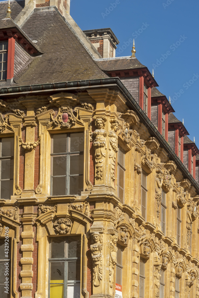 facade details of The Vieille Bourse, Old Stock Exchange in Lille, France