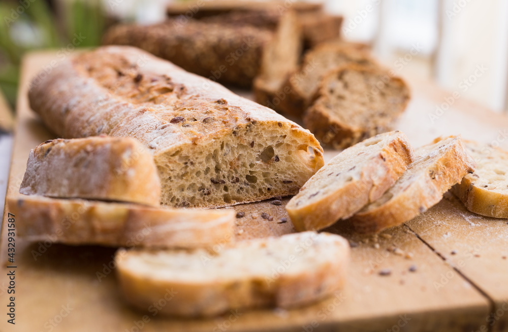 fresh loaf of bread on wooden board fresh loaf of bread on wooden board