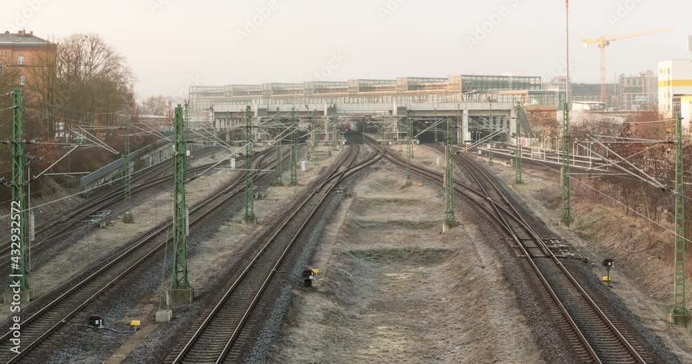 Timelapse of a train station in central Berlin, trains in 4k on a cold morning, high angle view over train tracks Timelapse of a train station in central Berlin, trains in 4k on a cold morning, high angle view over train tracks