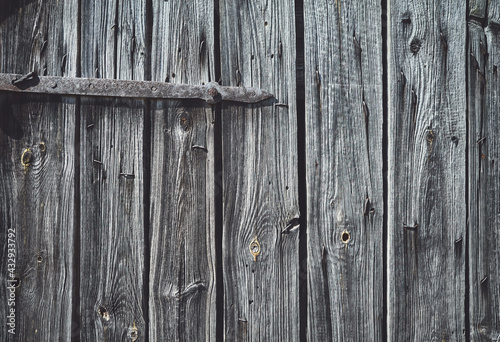 Picture of an old rough wooden board wall.