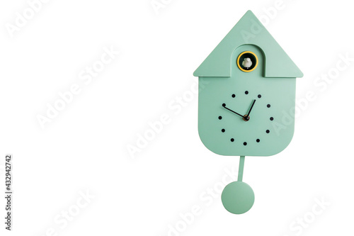 Close up view of grey wall cuckoo clock on white background. Sweden. photo