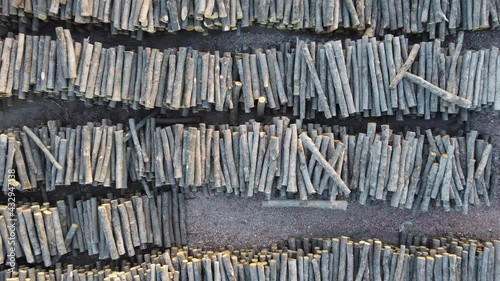 sawn tree trunks at a sawmill top view. aerial photography from a quadrocopter photo