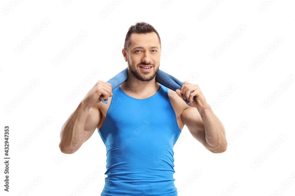 Man in sportswear holding a towel aroung his neck Man in sportswear holding a towel aroung his neck
