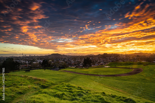 Burning sunrise over Auckland One Tree Hill, Mount Roskill New Zealand