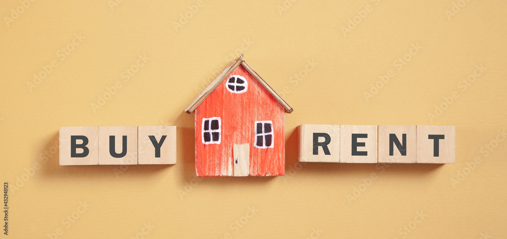 Buy or Rent house. Wooden cubes. Real Estate concept Buy or Rent house. Wooden cubes. Real Estate concept