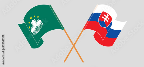 Canvas Print Crossed and waving flags of Macau and Slovakia