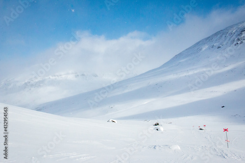 Snowshoeing Kungsleden trail from Abisko to Nikkaluokta in early April, Swedish Lapland photo