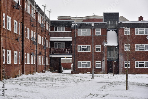 council flats seen on a snowy day