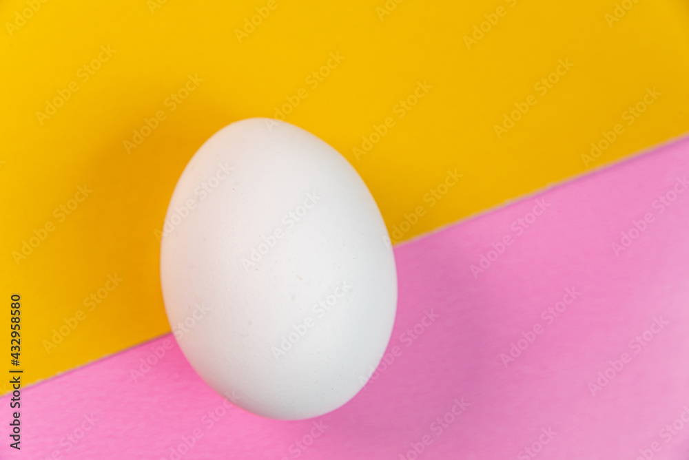 Eggs on the yellow and pink background Eggs on the yellow and pink background