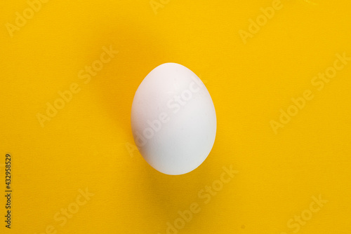 Egg on the yellow background