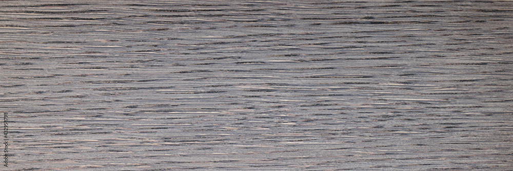 Dark gray wooden board. Floor coverings closeup Dark gray wooden board. Floor coverings closeup