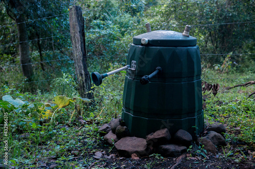 Fotografie Compost Bin Decorated like a Dalek in Countryside Garden