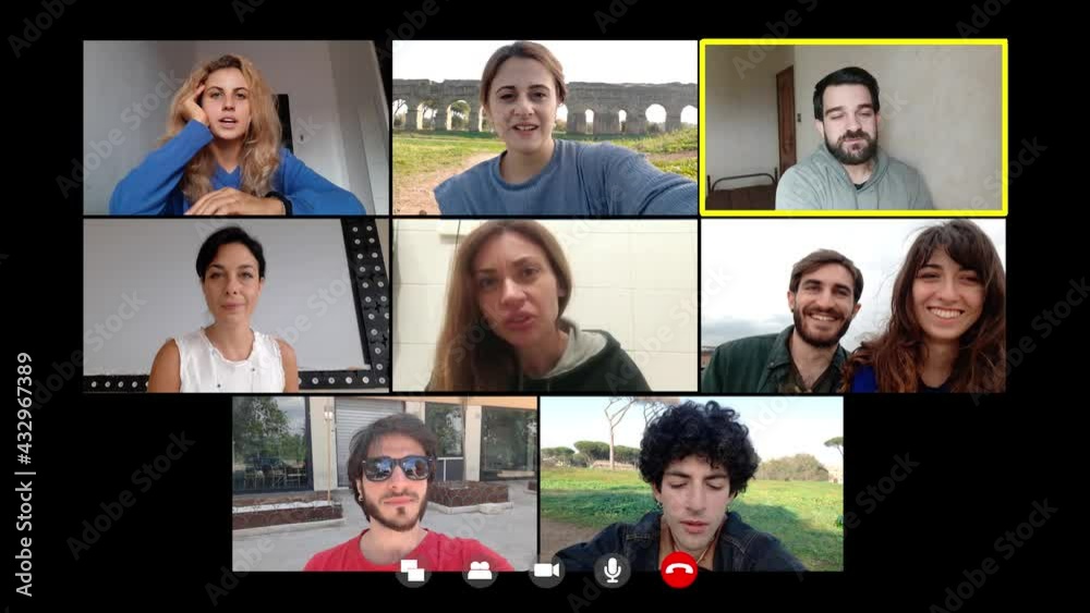 connection, internet - young man laughs and jokes with friends on video call connection, internet - young man laughs and jokes with friends on video call