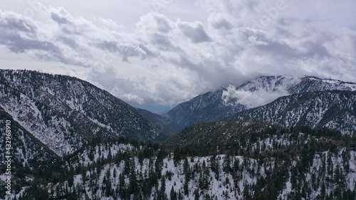 Aerial view in Big Bear, California of clouds rolling into the mountains