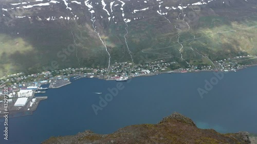 View of remote Iceland town Eskifjörður from Hólmatindur mountain peak photo