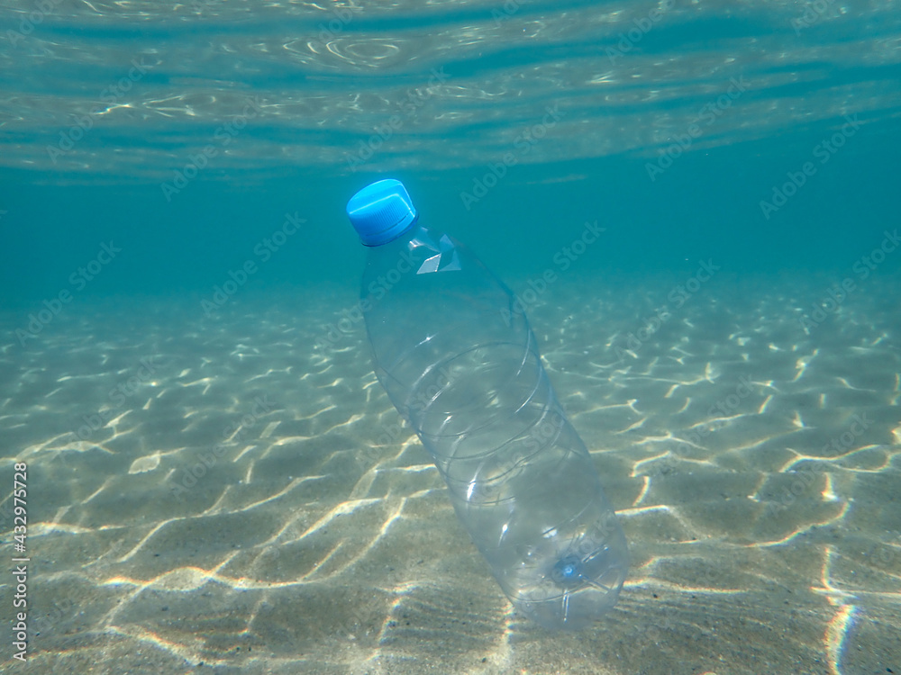 Problem plastic bottles and micro plastics floating in the open ocean