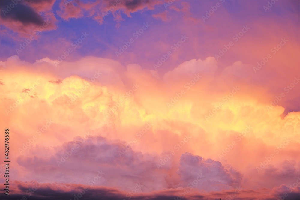 Fototapeta Heaven background.Sky.Multicolored clouds. Summer weather. Clouds of blue, lilac, yellow and pink colors. Heaven at Sunset.Colorful summer sky.Summer time