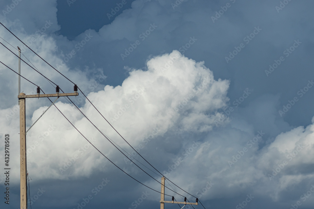Rain clouds in the sky and electric poles Rain clouds in the sky and electric poles