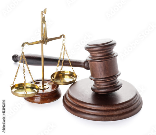 Judge's gavel and justice scales on white background