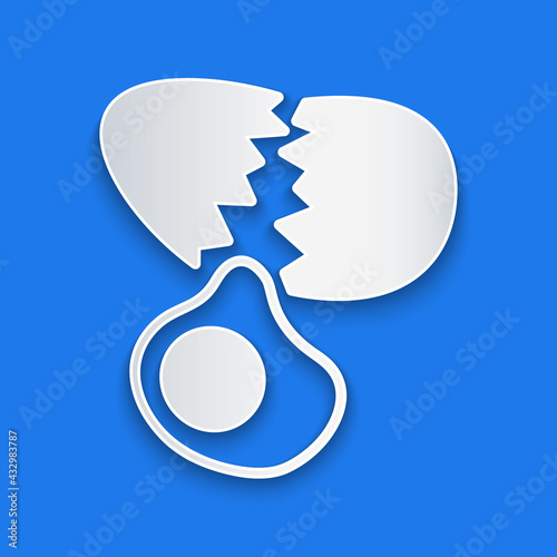 Paper cut Broken egg icon isolated on blue background. Happy Easter. Paper art style. Vector