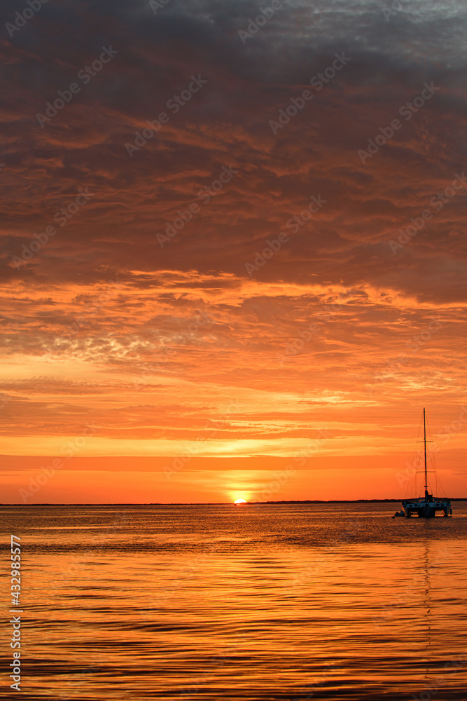 Ocean sea water. Sailing and yachting. Boat on water at sunset. Sailboats with sails.