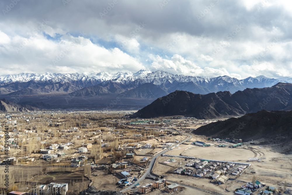 Beautiful landscape of Leh ladakh city from aerial view. City covered with mountains and a cold desert.
