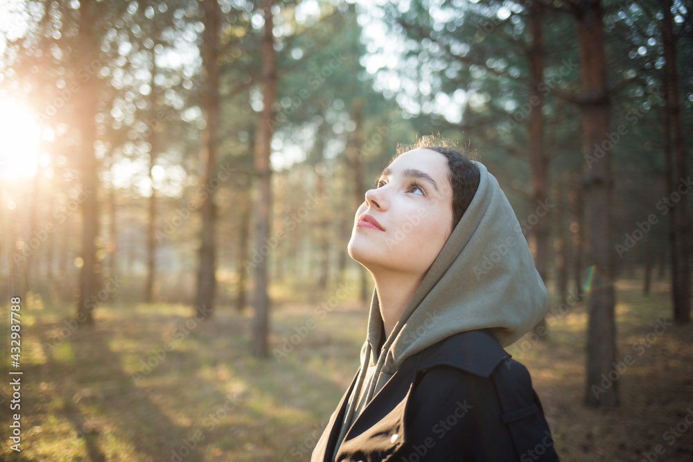 girl woman walking in nature park forest and breathing fresh air. concept of relaxing, Tranquility, Resting alone. girl woman walking in nature park forest and breathing fresh air. concept of relaxing, Tranquility, Resting alone.