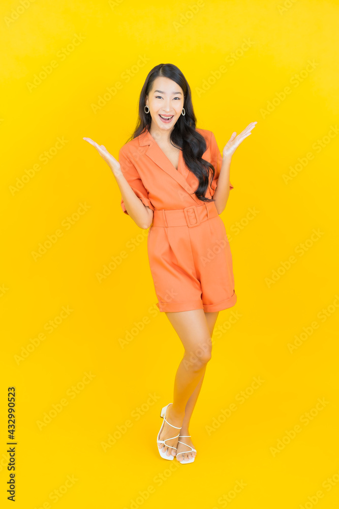 Portrait beautiful young asian woman smile with action Portrait beautiful young asian woman smile with action