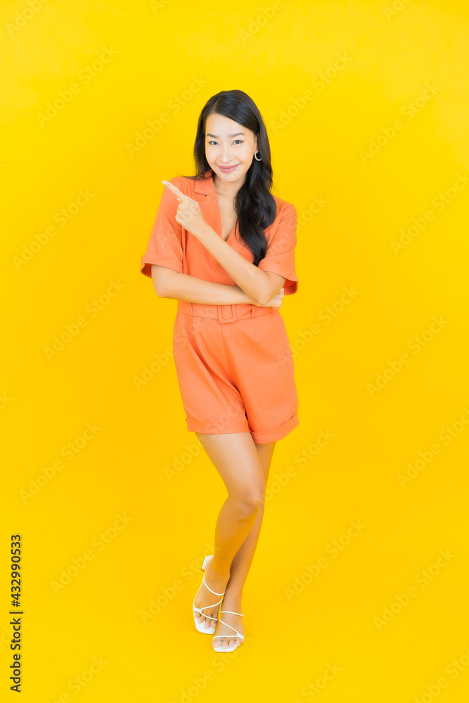 Portrait beautiful young asian woman smile with action Portrait beautiful young asian woman smile with action
