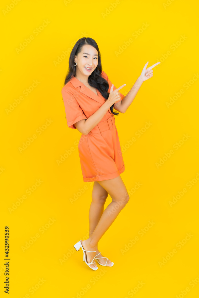 Portrait beautiful young asian woman smile with action Portrait beautiful young asian woman smile with action