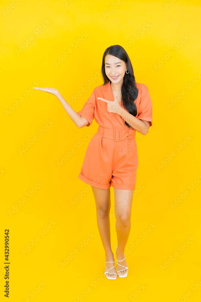 Portrait beautiful young asian woman smile with action Portrait beautiful young asian woman smile with action