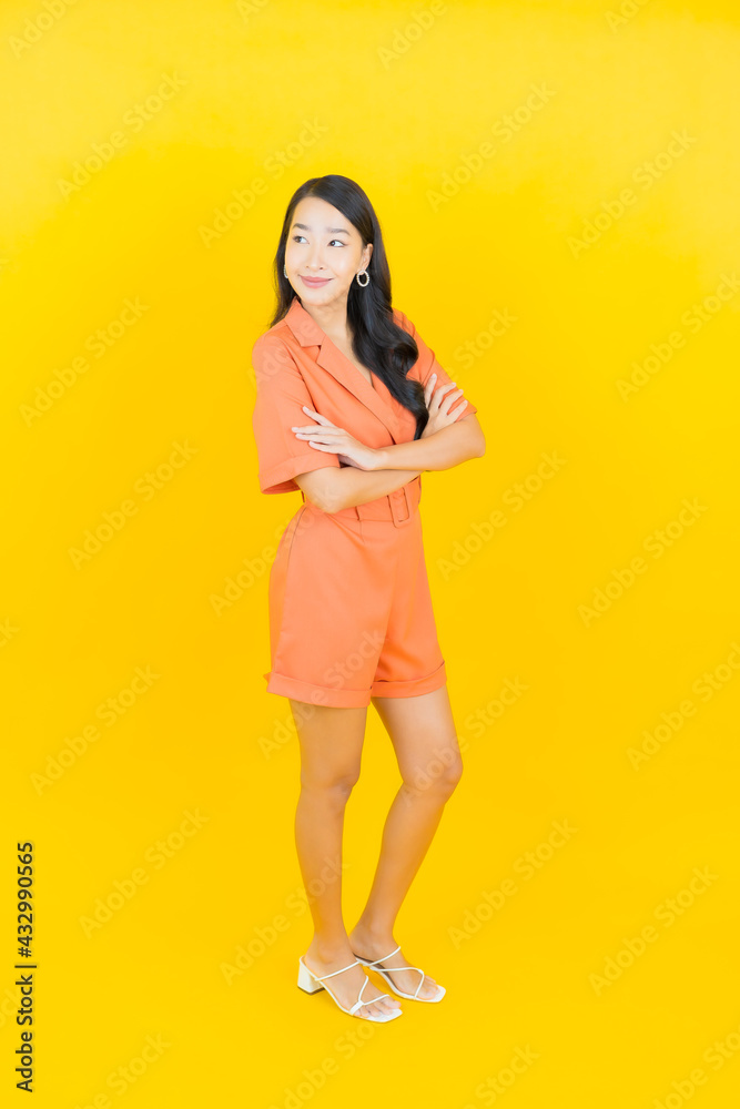 Portrait beautiful young asian woman smile with action Portrait beautiful young asian woman smile with action