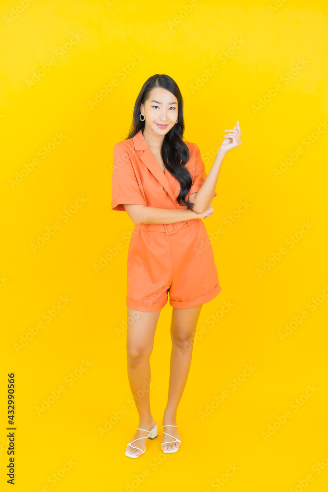 Portrait beautiful young asian woman smile with action Portrait beautiful young asian woman smile with action