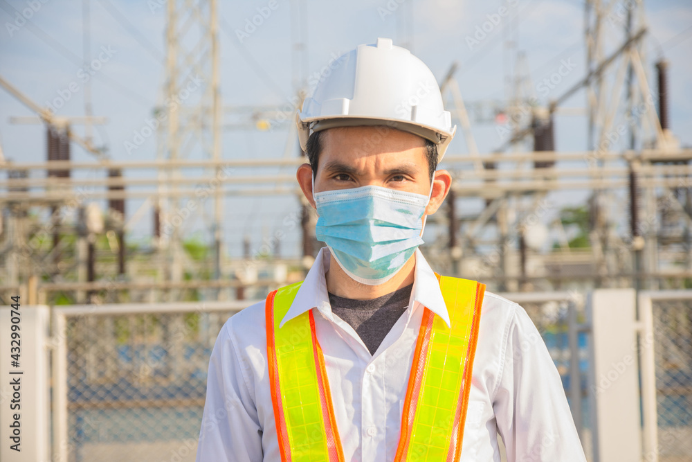 Asian man wear mask protect coronavirus and work in power plant