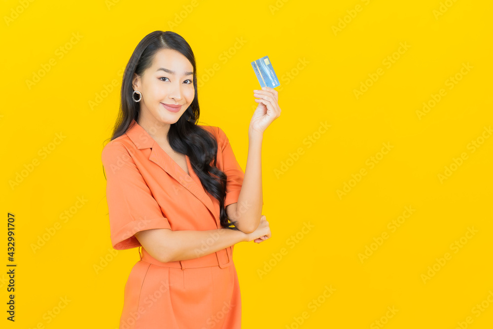 Portrait beautiful young asian woman smile with credit card Portrait beautiful young asian woman smile with credit card