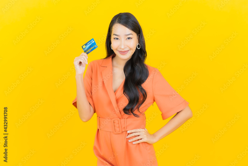 Portrait beautiful young asian woman smile with credit card Portrait beautiful young asian woman smile with credit card