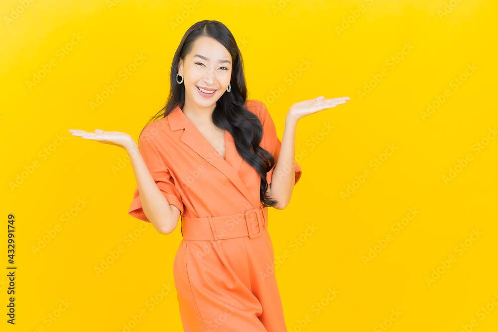 Portrait beautiful young asian woman smile with action Portrait beautiful young asian woman smile with action