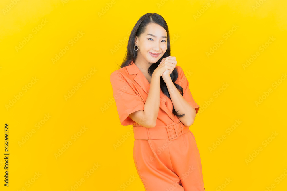 Portrait beautiful young asian woman smile with action Portrait beautiful young asian woman smile with action