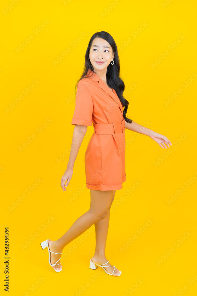 Portrait beautiful young asian woman smile with action Portrait beautiful young asian woman smile with action