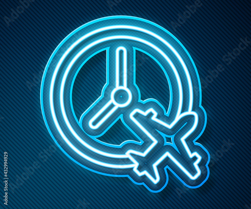 Glowing neon line Clock with airplane icon isolated on blue background. Designation of time before departure, check-in for flight and arrival time symbol. Vector