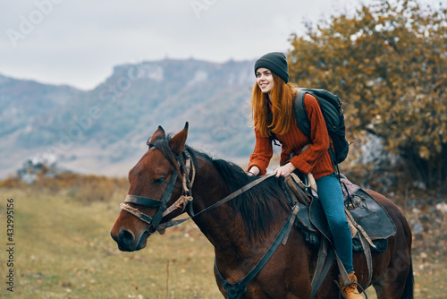 cheerful woman Tourist riding a horse nature mountains joy © SHOTPRIME STUDIO